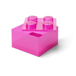 Roze doorzichtige opbergdoos in de vorm van een steen