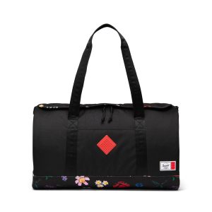 Herschel Heritage weekendtas - zwart met dwarrelende bloemen